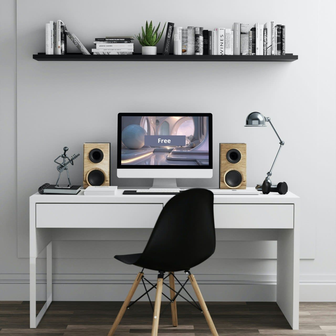 Modern home office setup with a white desk, black chair, computer monitor displaying 3D modeling course 'Free', speakers, and decorative items