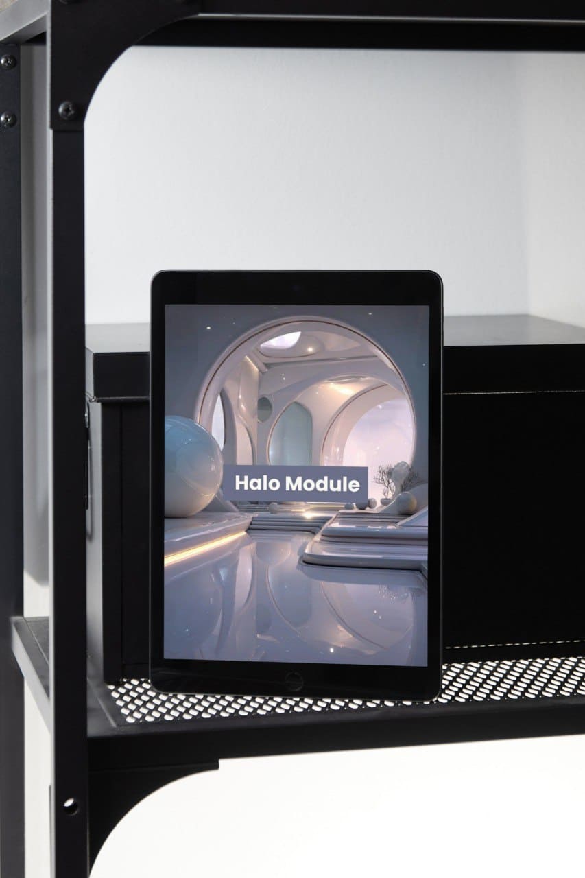 Tablet displaying an image of a 'Halo Module' on a black metal shelf.