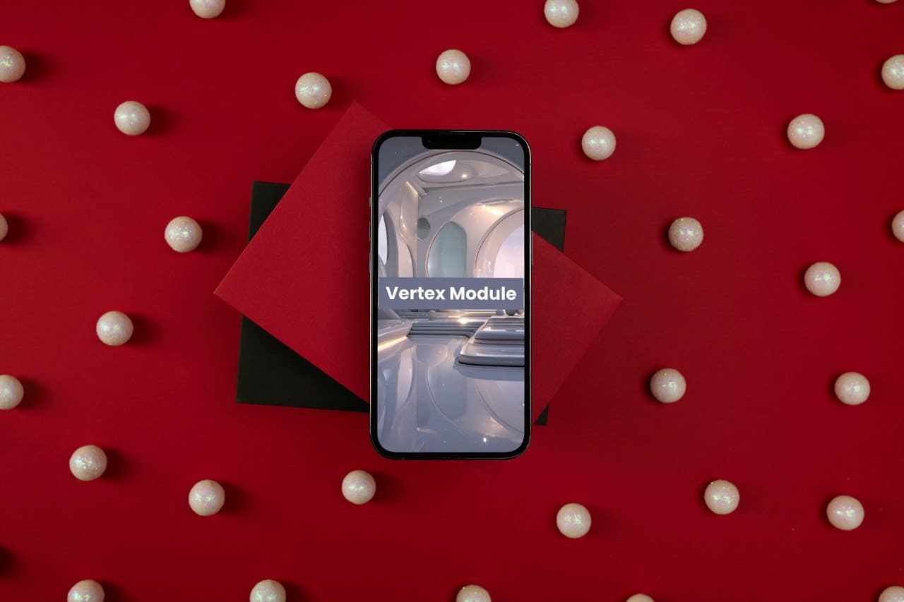 Phone displaying 'Vertex Module' course on a red surface with white spherical objects